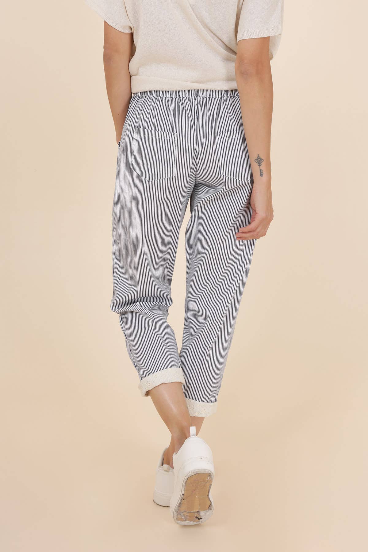 STRIPED PANTS WITH LACE CUFFS